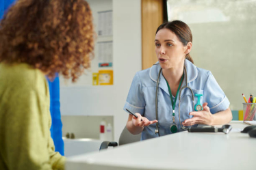 Nurse talking to patient